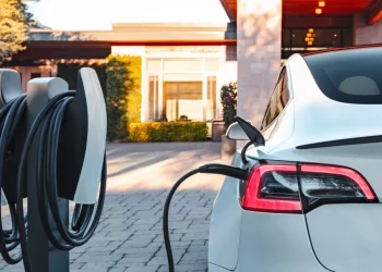 Is it cheaper to charge electric cars at home or at a charging station